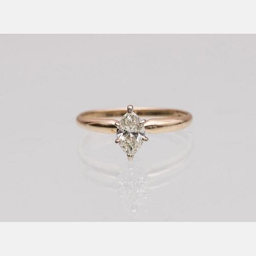 A 14kt. Yellow Gold and Diamond Ring,