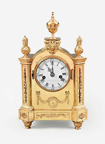 An unusual small gilt bronze mantel clock by Ellicott
