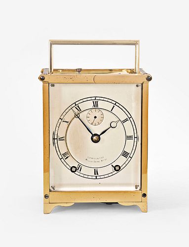 A good French carriage clock with chronometer escapement signed Comminges Paris