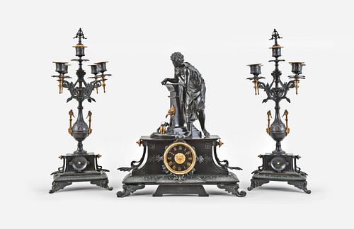 A late 19th century French gilt and patinated bronze clock garniture for Tiffany & Co.
