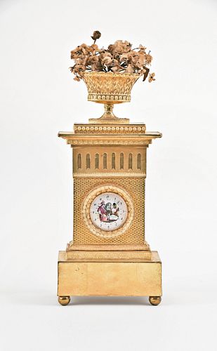 A rare early 19th century gilt card stock and Dresden trim clock