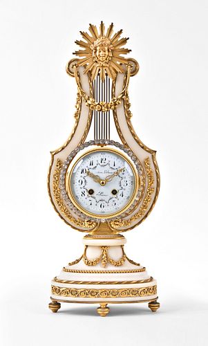 An early 20th century lyre form mystery clock with brilliant ring pendulum signed Festeau LeJeune
