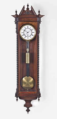 A mid 19th century month going weight driven Vienna regulator timepiece