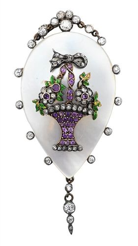 Victorian Mother of Pearl Brooch, mounted with amethyst, diamond, and enameled basket having 21 diamonds around the edge, height 3 inches.