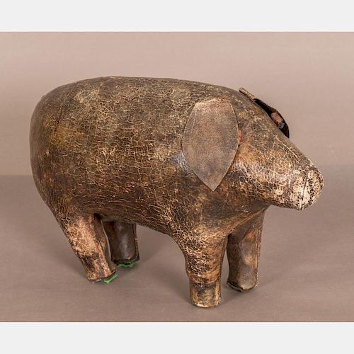 A  Dimitri Omersa (1927-1985) Abercrombie and Fitch Leather Pig Foot Stool.