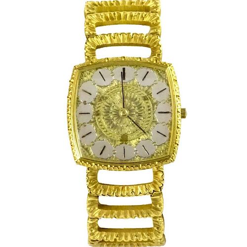Vintage Buccelatti 18 Karat Yellow Gold Bracelet Watch with Universal Genève Manual Movement.