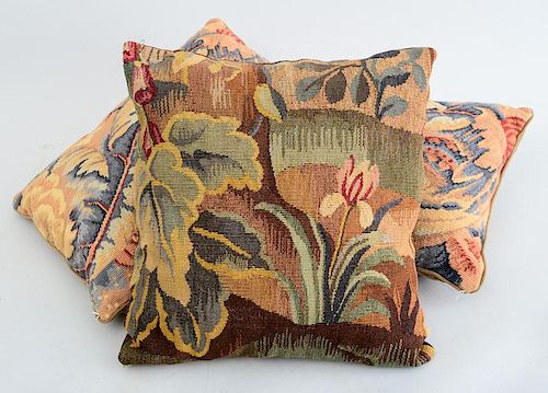 GROUP OF THREE VERDURE TAPESTRY PILLOWS AND TWO NEEDLEWORK PILLOWS