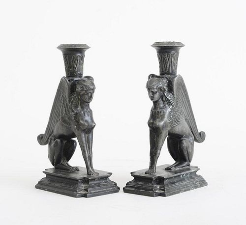 PAIR OF EMPIRE STYLE CAST-METAL SPHINX-FORM CANDLESTICKS