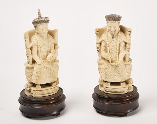 Pair of Asian Figures on Wooden Stands