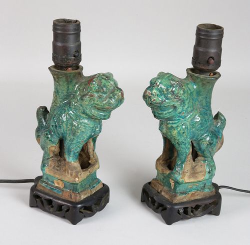 Pair of Antique Chinese Green Glazed Terra Cotta Foo Dog Lamps on Teak Bases