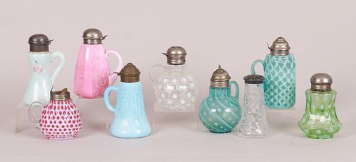 A Group of Victorian Glass Syrup Pitchers