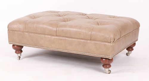A Tufted Leather Ottoman