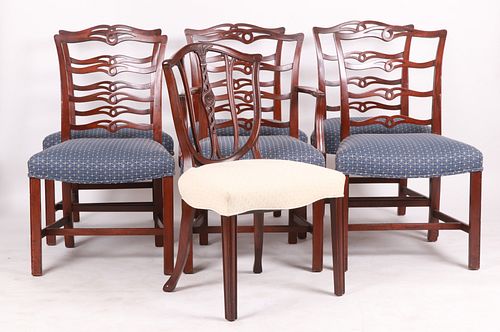 A Set of Chippendale Style Dining Chairs
