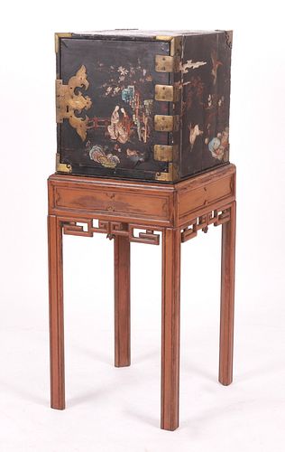 A Chinese Coromandel Lacquer Chest On Stand