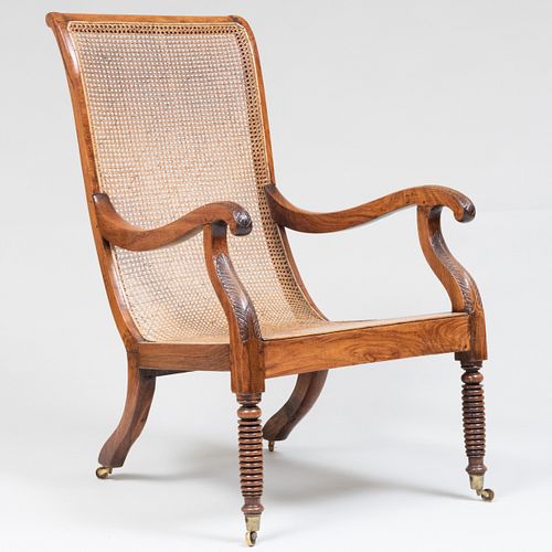 Anglo-Indian Carved Hardwood and Caned Armchair