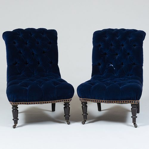 Pair of Victorian Ebonized and Blue Velvet Tufted Slipper Chairs