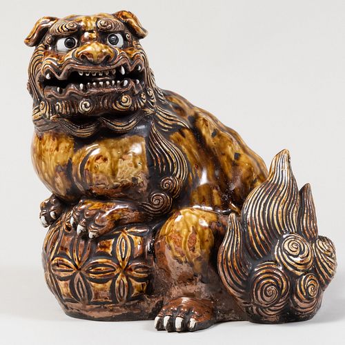 Japanese Brown Glased Earthenware Figure of a Buddhistic Lion