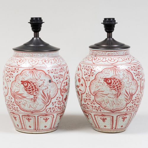 Pair of Asian Iron Red Decorated Earthenware Jars mounted as Lamps