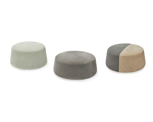 Three contemporary suede pouf cushions