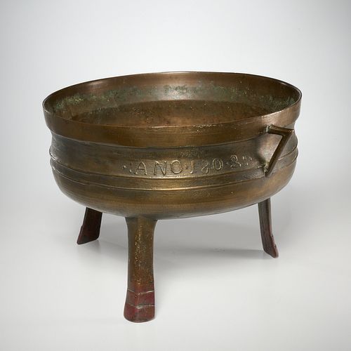 Large antique European bronze tripod cauldron