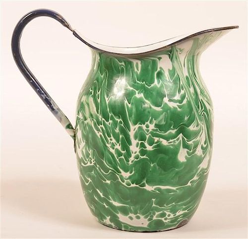 Green and White Granite Ware Water Pitcher.