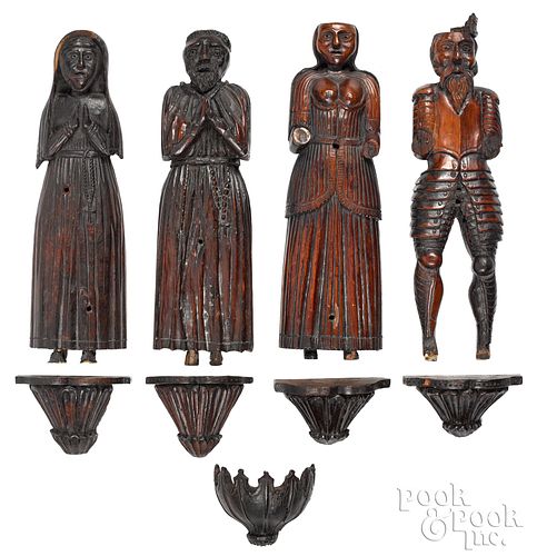 Four Continental carved pine figures, 17th c.