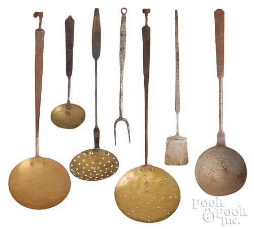 Seven wrought iron and brass utensils, 19th c.