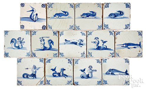 Thirteen Delft blue and white sea subject tiles