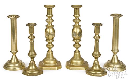 Three pair of English Victorian brass candlesticks