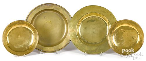 Two brass deep dishes and two plates 18th c.