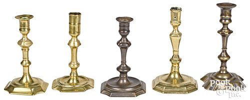 Five English Queen Anne brass candlesticks