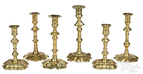 Six English Queen Anne brass candlesticks