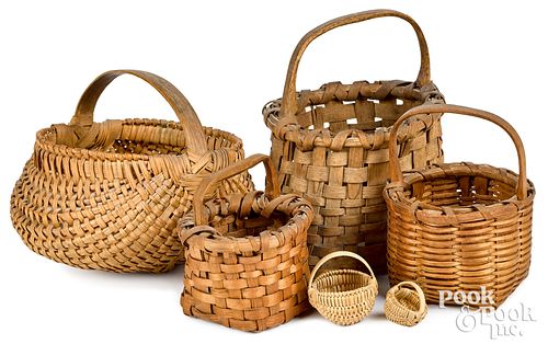 Six small woven splint baskets