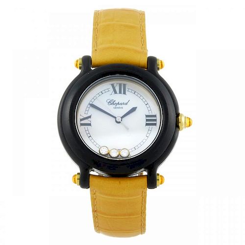 CHOPARD - a lady's Be Happy wrist watch. Black plastic case with gold plated case back. Numbered 781