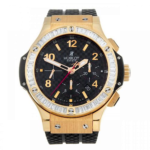 CURRENT MODEL: HUBLOT - a gentleman's Big Bang chronograph wrist watch. 18ct rose gold case with exh