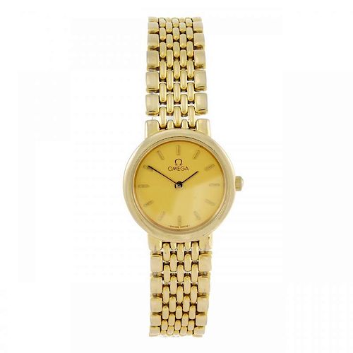 OMEGA - a lady's De Ville bracelet watch. Gold plated case. Numbered 54055291. Unsigned quartz movem