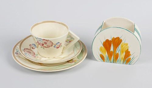 A Clarice Cliff crocus pattern bonjour shape vase, a Clarice Cliff Chippendale pattern tea cup, sauc
