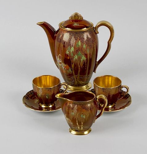 A Carltonware Rouge Royal coffee set. Comprising tall ovoid pot, milk jug, lidded two-handled sucrie