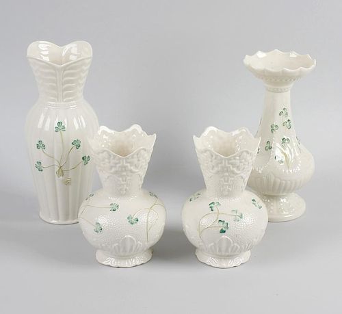 A collection of Belleek china wares. Each having shamrock decoration upon a cream ground, to include