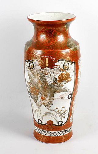 A large Kutani porcelain vase, of slight baluster form below a waited neck, decorated with a panel o