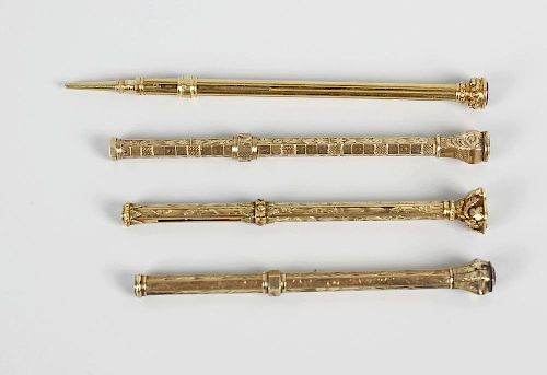 Four yellow metal propelling pencils, three having hexagonal body with foliate engraving, leading to