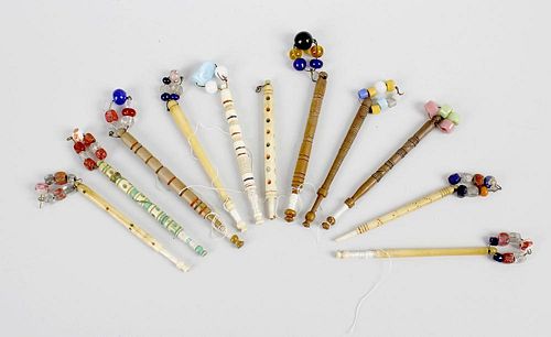 A mixed selection of 19th century turned bone and wooden lace bobbins, some having names, (qty).