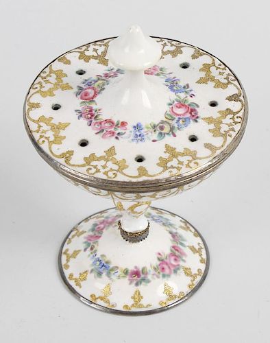A 19th century French enamel pomander, having a pierced circular cover over a shallow dish raised up