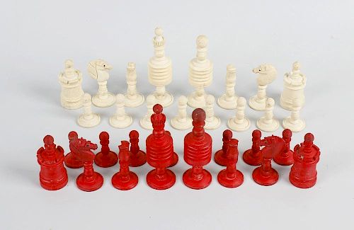 A Victorian stained ivory and bone barleycorn pattern chess set, in stained wooden case.