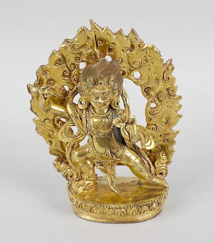 A good Sino Tibetan gilt bronze figure modeled as Buddhist deity. Probably Mahakala, 17th/18th centu