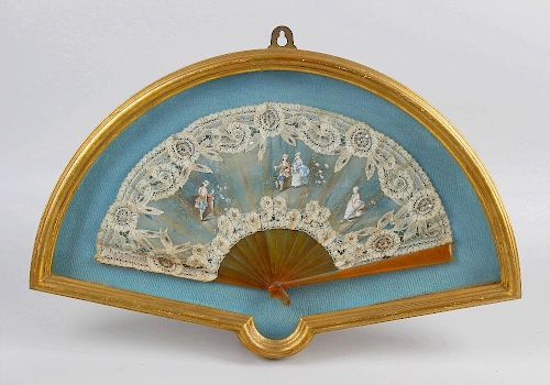 Two cased fans, the first with lace edges and painted with courting couples, the second with ostrich
