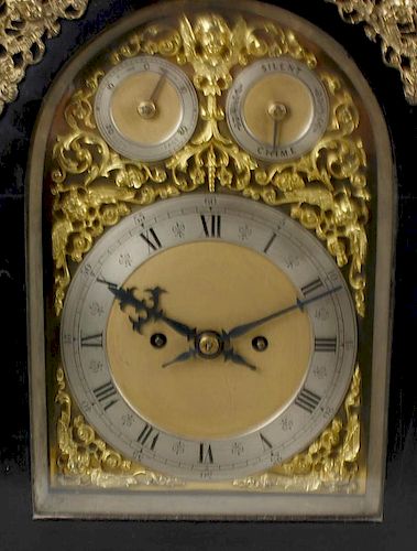 A good late 19th century ebonised fusee bracket or table clock, the 8.5-inch arched brass dial havin