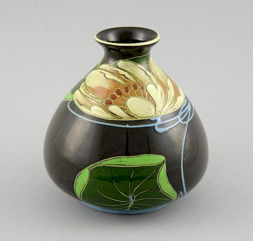Ceramic vase with bold design of water lilies,  in art Nouveau manner,  signed within the design R D