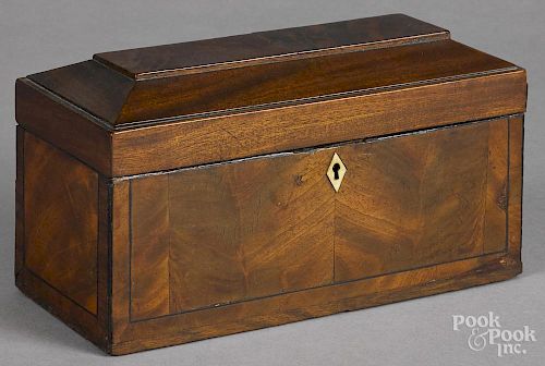 Regency mahogany tea caddy, early 19th c., with a fitted interior, 5 1/2'' h., 10'' w.