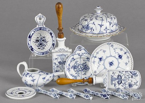 Blue and white ceramics, 19th/20th c., to include knife rests, a tea strainer, etc.